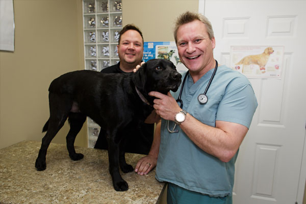 Doctor with a black dog